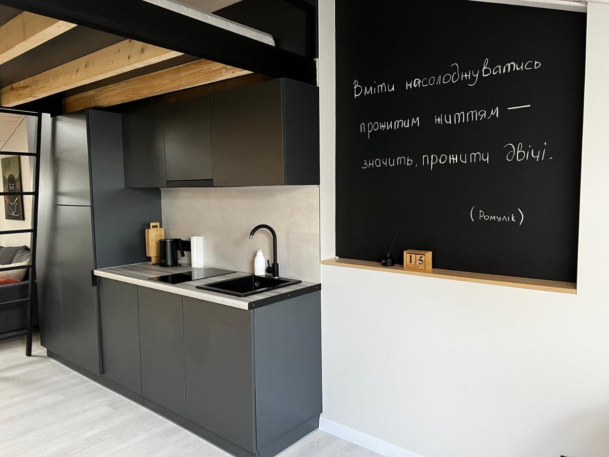 «Гори́Ще На Площі Польський Ринок» Apartment คาเมียเนตส์-โปดิลสกี ภายนอก รูปภาพ